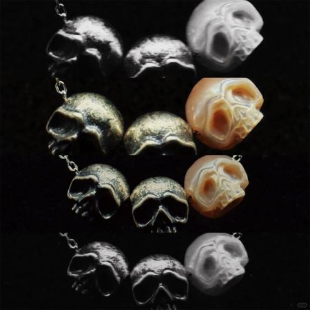 Dark Carved Skull Pearl Necklace