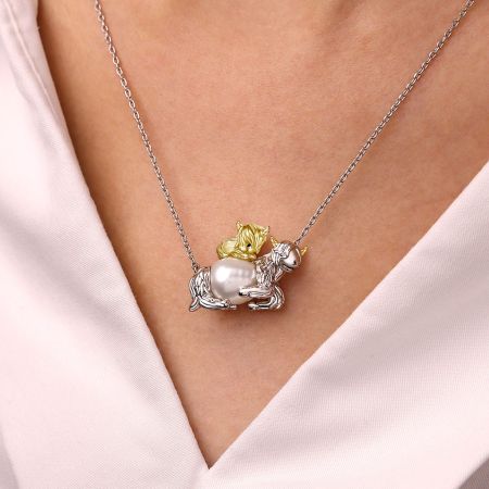Highland Cow Mother Carrying Child Necklace
